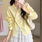 Yellow lace blouse, irregular hem