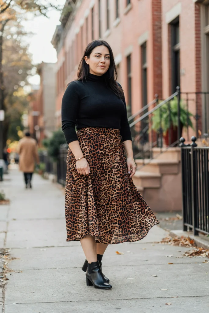 Black Turtleneck with Animal Print Midi Skirt