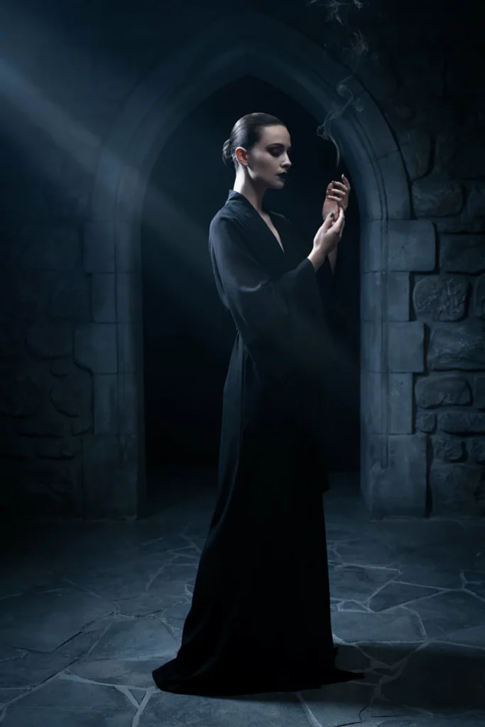  Slicked Low Bun for a Dark Sorceress Look